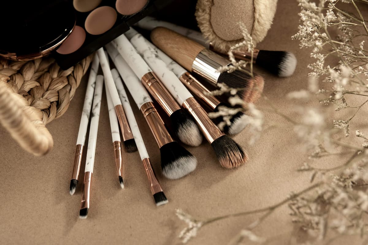 Beauty products flatlay in neutral tones