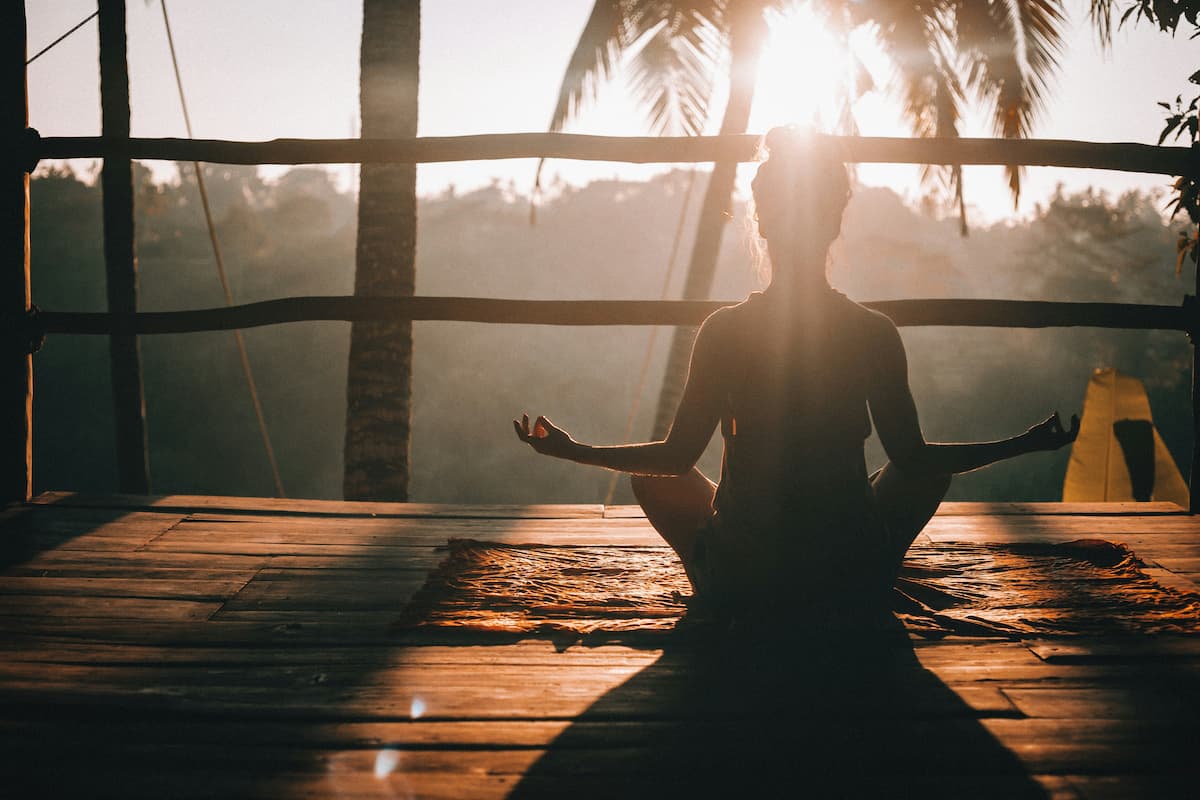 Woman in calm morning light representing wellness routine